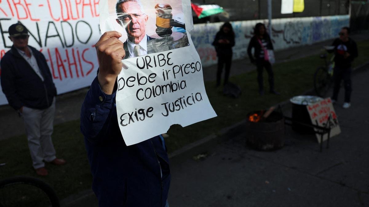 Colombian former President Álvaro Uribe is sentenced to 12 years house arrest for bribery